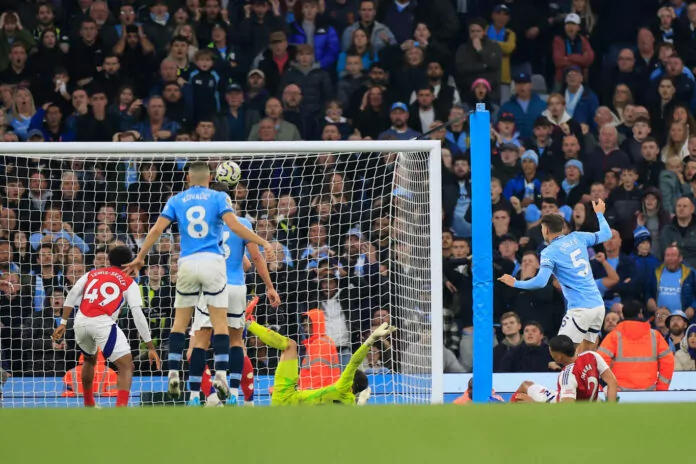 Manchester City v Arsenal Premier League 22/09/2024. John Stones (5) of Manchester City scores to make it 2 2 during the